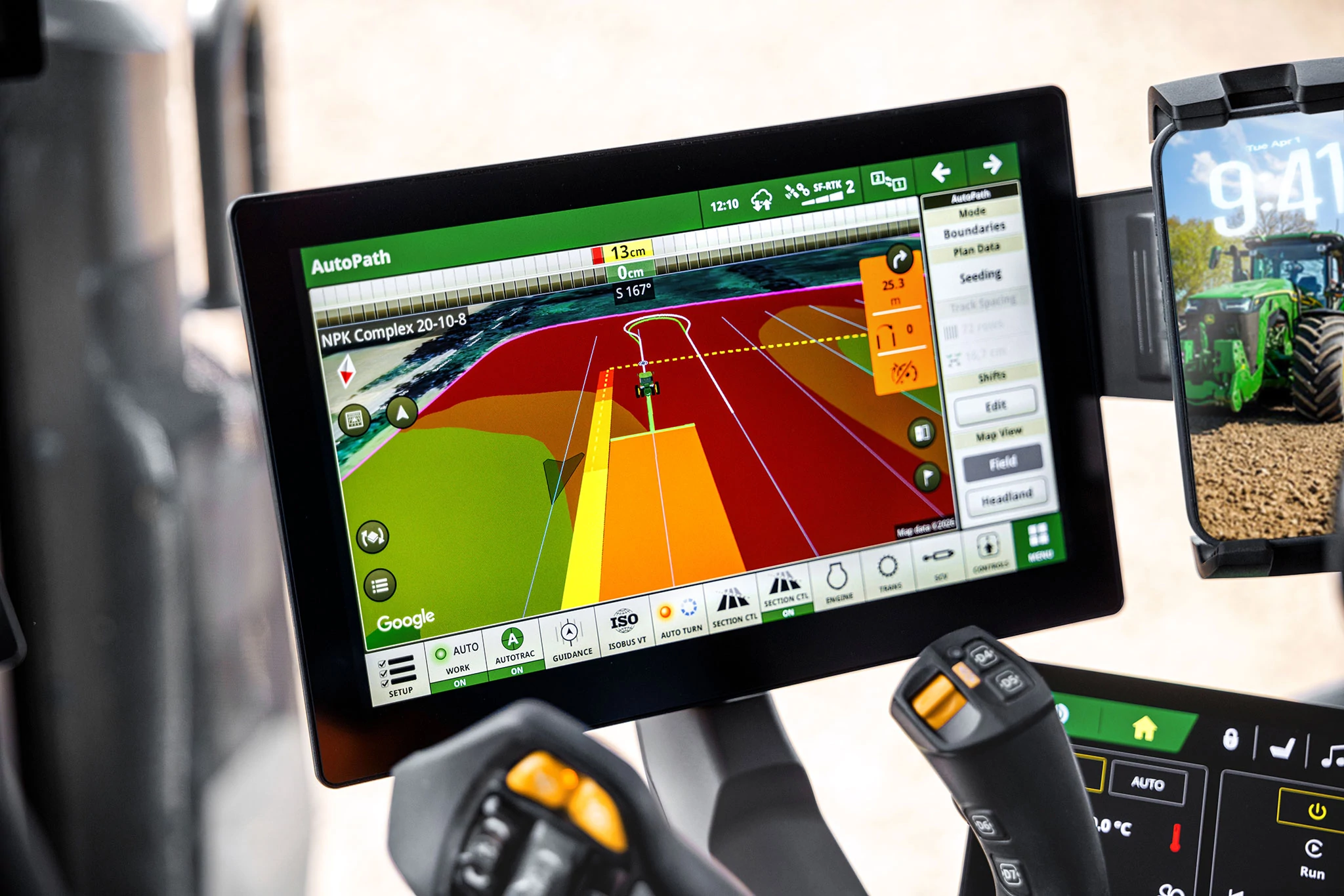 Precision farming display showing AutoPath guidance and nutrient application map on John Deere G5Plus screen