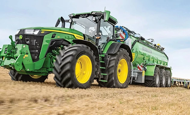 8R410 Large Wheel Tractor With Implement Automation Action Shot - Front Left View